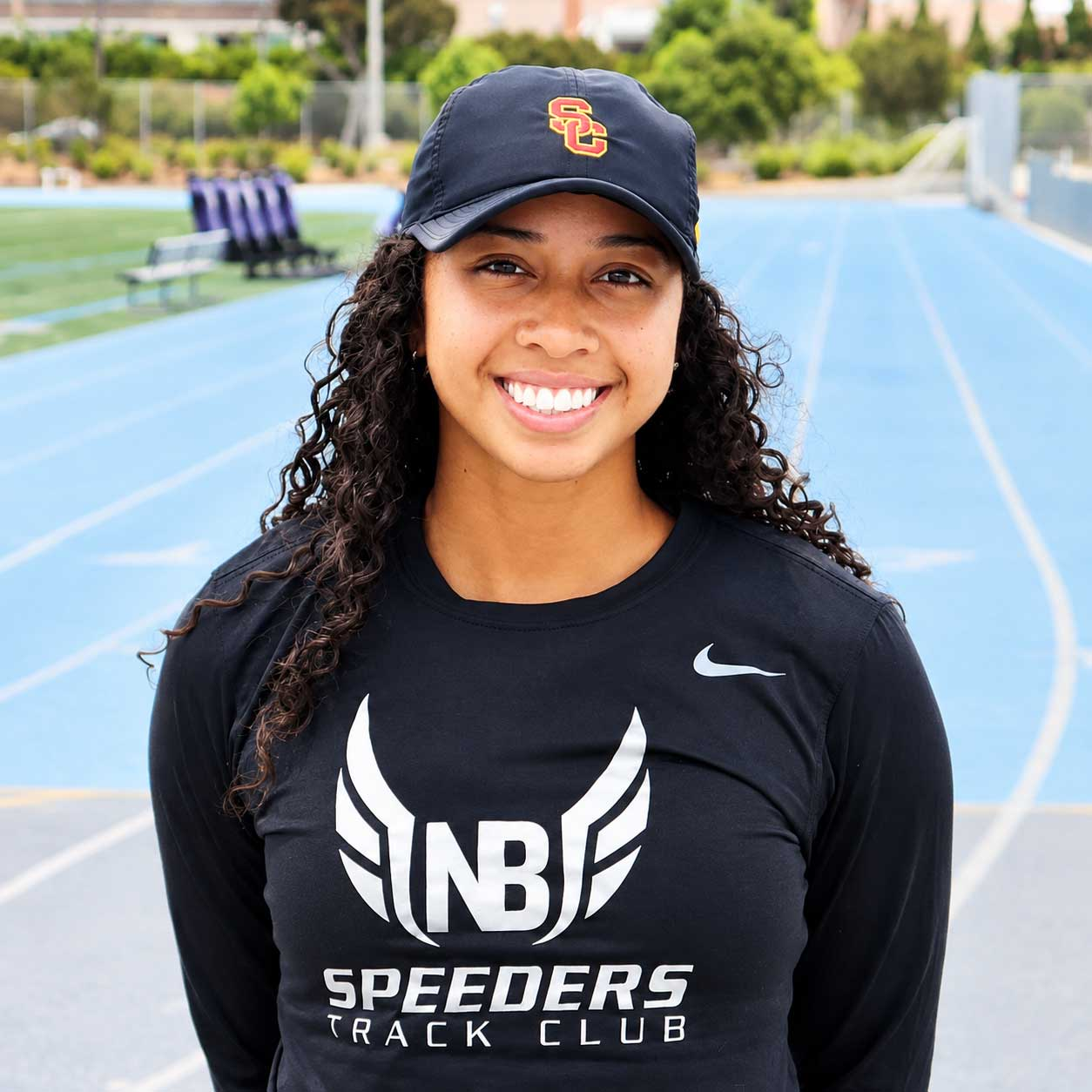 Zion Corrales-Nelson - Head Track Coach